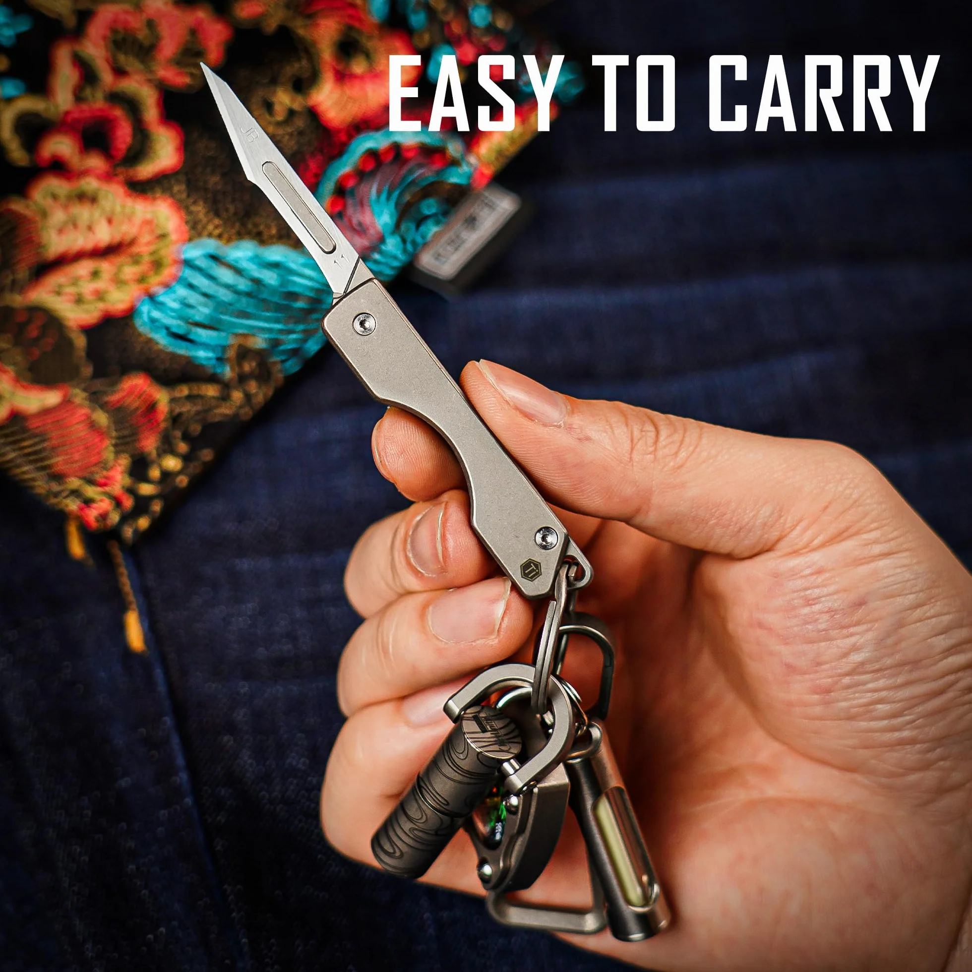 KeyUnity Cuchillo plegable de titanio KK01S EDC con hoja reemplazable
