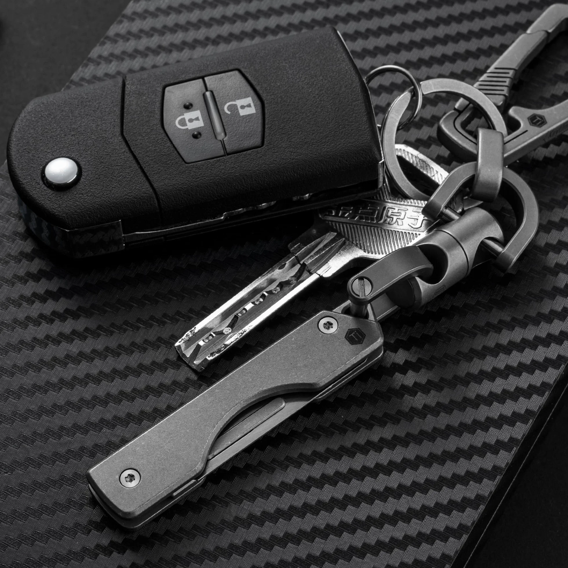 KeyUnity Cuchillo plegable de titanio KK01S EDC con hoja reemplazable