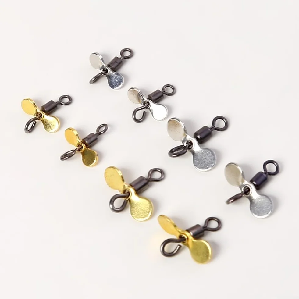 Cuchillas giratorias de pesca de metal turbo doradas y plateadas